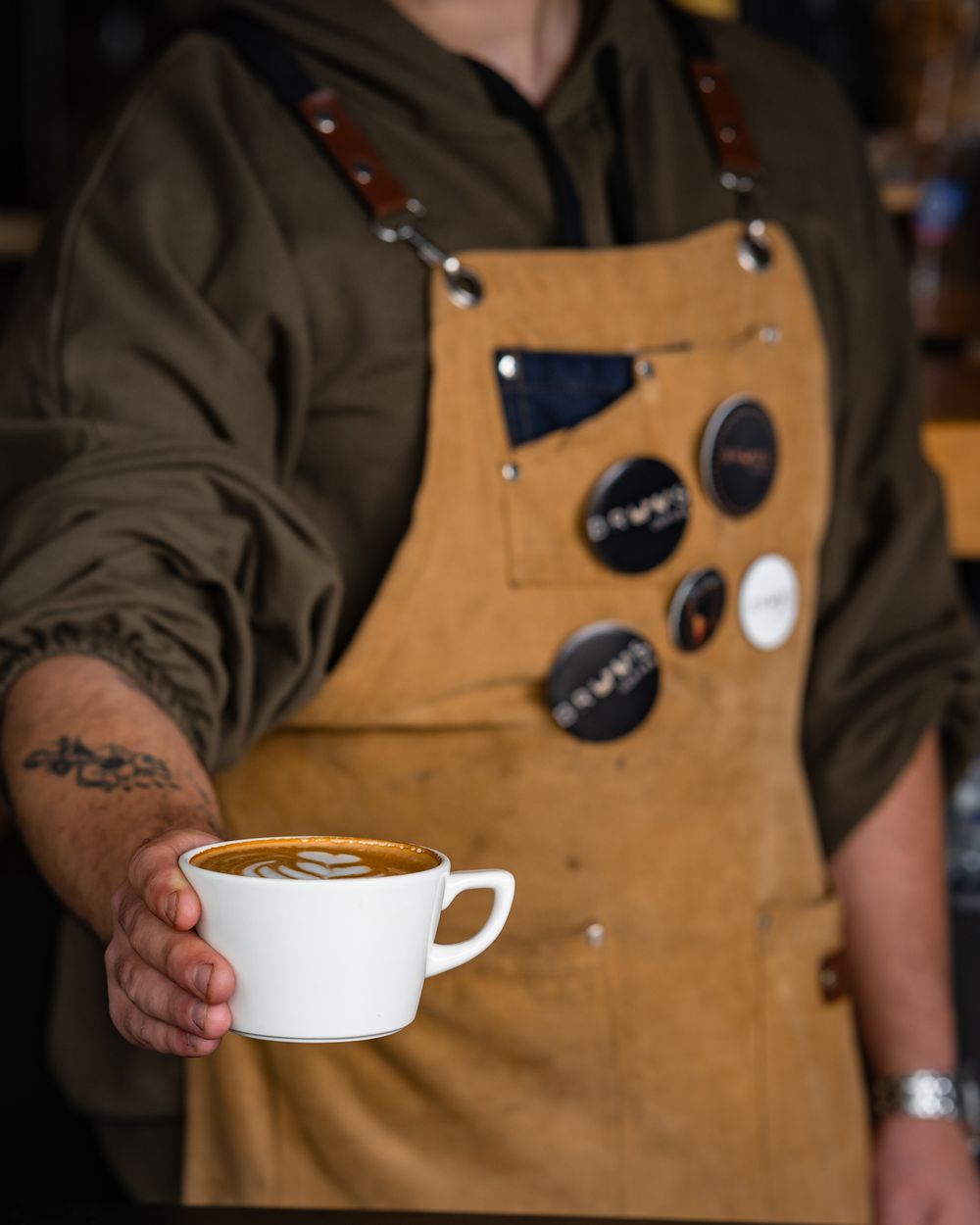 Latte art being poured