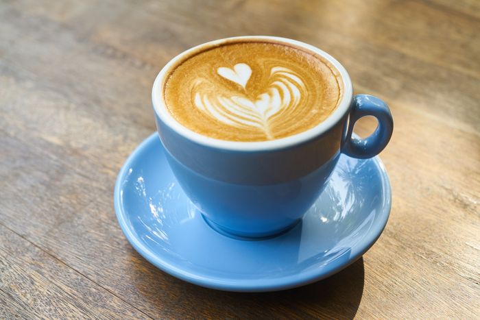 Flat white in a glass cup